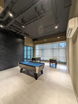 a billiard room with a pool table in it at Amazing Views & Eco Friendly Luxury Onsen Suites, Lost World of Tambun in Ipoh