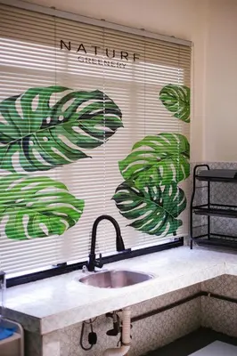 a window in a kitchen with a window blind with a plant at monstera homestay near Tambun, Ipoh Garden East in Ipoh