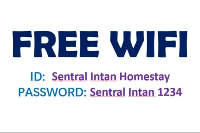 a label with the words free wifi in blue at 1 MINUTES TO TOWER SENTRAL INTAN HOMESTAY 6 ROOMS in Teluk Intan