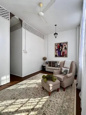 a living room with two chairs and a couch at Pertak Siring at Kuala Kubu Bharu in Kuala Kubu Baharu