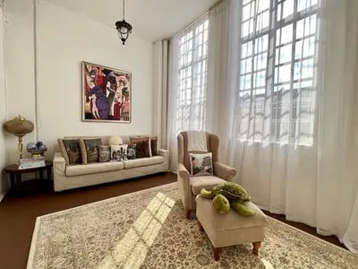 a living room with a couch and a chair at Pertak Siring at Kuala Kubu Bharu in Kuala Kubu Baharu
