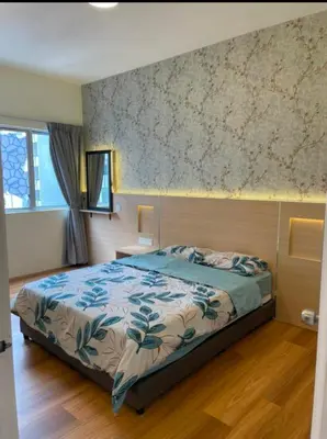 a bedroom with a bed and a wall at Cameron Homestay klasik Adik Aisyah in Cameron Highlands