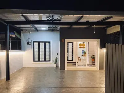 a large room with two doors in a building at M12 Homestay, Butterworth in Butterworth