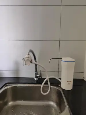 a kitchen sink with a faucet and a cup at Fraser Hill Silverpart Resort A3-1-1 Forest View With Lift in Bukit Fraser