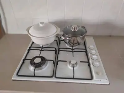 a stove top with a pot on top of it at Fraser Hill Silverpart Resort B2-6-1 Forest View High Floor No Lift in Bukit Fraser