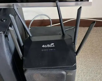a black router sitting on top of a chair at Fraser Hill Silverpart Resort B2-6-1 Forest View High Floor No Lift in Bukit Fraser