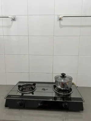 a stove top with a pot on top of it at Fraser Hill Silverpart Resort A3-6-3A Best View With Lift in Bukit Fraser