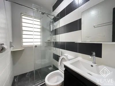 a bathroom with a toilet and a sink at Ipoh 27 Private Pool Villa By Verve EECH118 in Ipoh