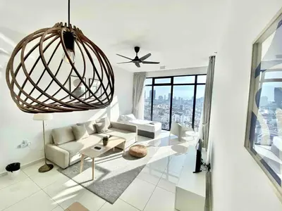 a living room with a couch and a chandelier at Beacon Executive Suites #Warmth #SkyPool #Georgetown #5pax #2BR 2bath #2Queen 1Single #Quality well maintained #Private host in George Town