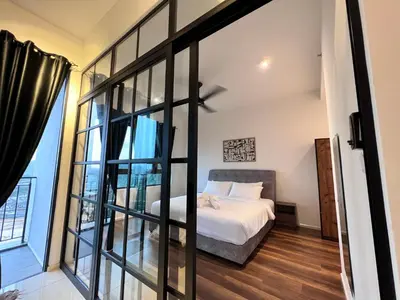 a bedroom with a bed and a large window at Ojies Onsen - 3 guest only in Ipoh