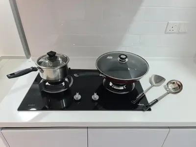 a pot sitting on top of a stove at Beacon Executive Suites - Penang in George Town