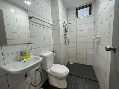 a white bathroom with a toilet and a sink at Ammara homestay @ Palas Horizon kea Farm in Brinchang
