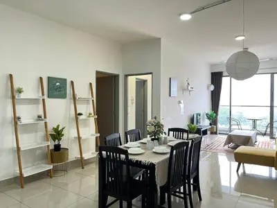 a dining room with a table and chairs in a living room at Ammara homestay @ Palas Horizon kea Farm in Brinchang