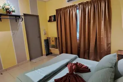 a living room with a couch and a large window at My Chillex Homestay#Muslim Guest Only#3R 2B Apartment in Penang# in George Town