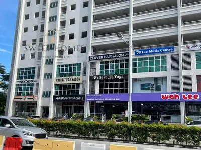 a building with cars parked in front of it at HolidayCozy StraitsGardenSuite Penang#6pax#family in George Town