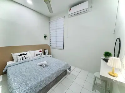 a white bedroom with a bed and a lamp at Ipoh 42 Symphony 12pax 4Bedroom 3bathroom 3carpark in Ipoh