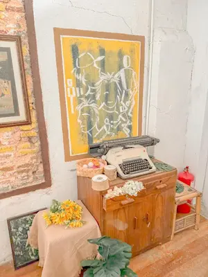 a room with a keyboard and a painting on the wall at Tonight Hotel in George Town