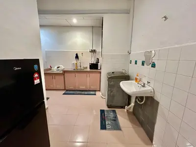 a small bathroom with a sink and a counter at Cozy255#4pax#Wifi#NearAeonAlma#5kmtoIconCity in Bukit Mertajam