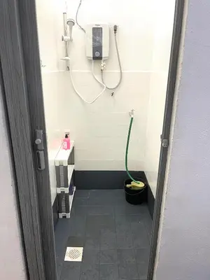 a bathroom with a shower with a toilet in a stall at Cozy33#4pax#Wifi#NearAeonAlma#20minstobatukawan in Bukit Mertajam