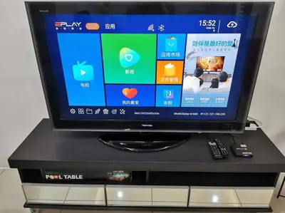 a flat screen tv sitting on top of a table at Botani Tmn Cyber Ipoh(24 pax /tv box/mahjong) in Ipoh