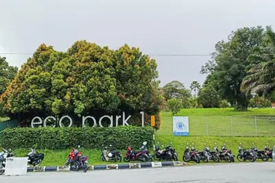 a group of motorcycles parked in front of a sign at Bdr Seri Botani ipoh-nordic (tvbox/mahjong 19pax) in Ipoh