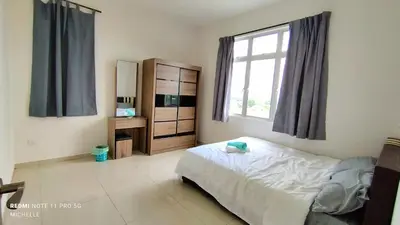 a bedroom with a bed and a window at Spaces 3bed Room New Condo @ Kg Paloh Ipoh in Ipoh