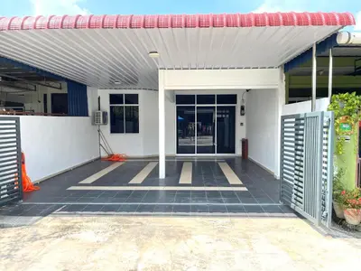 an outside view of a building with a garage at Cozy288#4pax#wifi#NearAeonAlma,Mcd#2kmtoIconicPoint in Bukit Mertajam