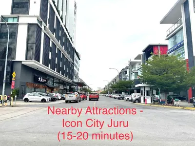 a city street with cars parked on the street at Cozy288#4pax#wifi#NearAeonAlma,Mcd#2kmtoIconicPoint in Bukit Mertajam
