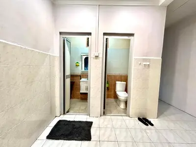 a bathroom with a shower and a toilet in it at Cozy14#4pax#Wifi#NearAeonAlma#5kmtoIconCity in Bukit Mertajam