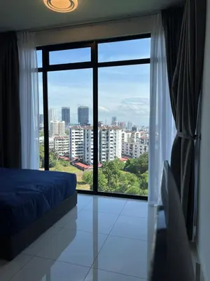 a bedroom with a large window with a view of a city at Beacon Executive Suites #Georgetown #RoofTopPool #10 in George Town