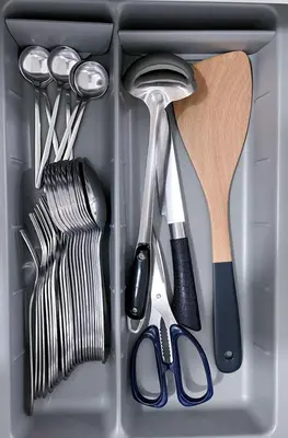 a drawer full of kitchen utensils in a refrigerator at Beacon Executive Suites #CozyFamilyStay #RoofTopPool #16 #10paxs in George Town