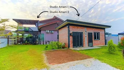 a house with the words studio amani and the words studio annex istg at Studio Amani 1 Permatang Pauh in Permatang Pauh