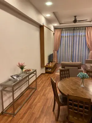 a living room with a table and a couch at zarraz homestay The Retreat Nova Kea Farm Brinchang in Brinchang
