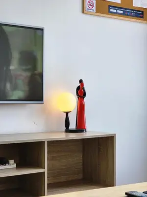a lamp sitting on a table next to a television at The MINDI, 2BR Cityview by WStay @ Tropicana 218 Macalister in George Town
