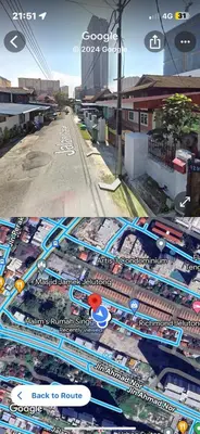 an aerial view of a city with a train track at Halim's Rumah Singgah Mxslim only in Jelutong