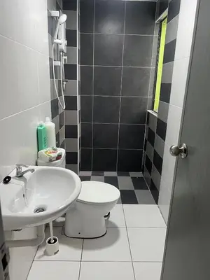 a bathroom with a toilet and a sink at Cozy homestay Manhattan Ipoh,12 pax \u6021\u4fdd\u6c11\u5bbf in Ipoh