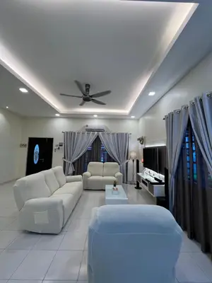 a living room with white furniture and a ceiling at Entire Vacation Home with landscape garden in Sitiawan