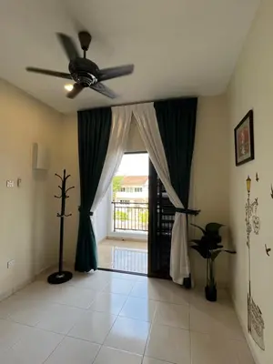a living room with a ceiling fan and a window at Entire Vacation Home with landscape garden in Sitiawan