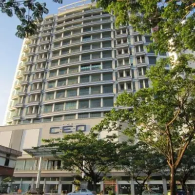 a large building with a sign on the side of it at 6PAX NEAR USM n PANTAI HOSPITAL n SPI CE ARENA in Bayan Lepas