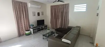 a living room with a couch and a tv at Setia Residen Semi-D two half storey 5 Bedrooms unlimited wifi in Sitiawan