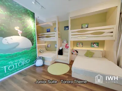 a room with a bunk bed and a tv at Ipoh Sunway Onsen Suites and Tambun Guesthouse , 3-14pax 2parking by IWH in Ipoh