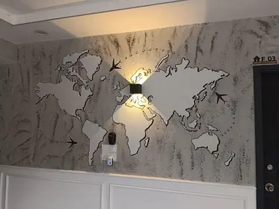 a wall with a map of the world on it at I Do Farmstay in Bukit Mertajam