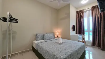 a bedroom with a bed and a window at Rooms at Mansion One, Shared Apartment Only in George Town