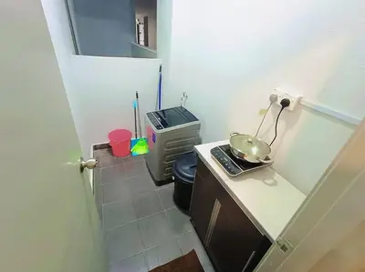 a small bathroom with a toilet and a sink at Freezing Point Homestay @ Palas Horizon Residence in Cameron Highlands
