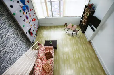 an overhead view of a room with a climbing wall at Private Rock Climb at The CEO Penang in Bayan Lepas