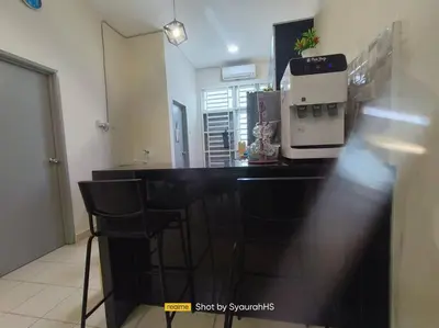 a kitchen with a counter with a coffee maker on it at Syaurah Homestay Bagan Serai Dua Tingkat 4 Bilik in Bagan Serai