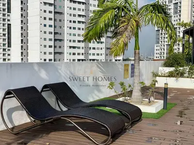 two chairs sitting on a patio with a palm tree at R&W 1-5pax B'worth Prai #Netflix #6minPenangBridge in Perai