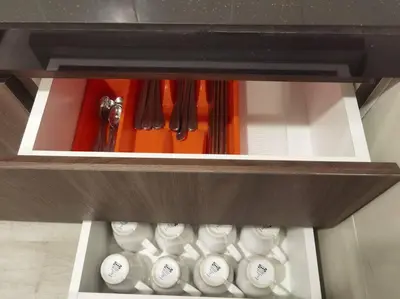 a drawer with a bunch of white coffee cups at Emerald Avenue Cozy 1BR Studio Suite in Brinchang