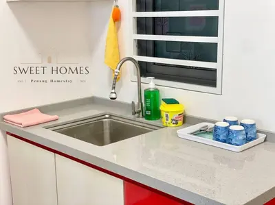 a kitchen counter with a sink in a kitchen at Blue Studio Suite 1-4pax B'Worth Prai@SwimmingPool in Perai