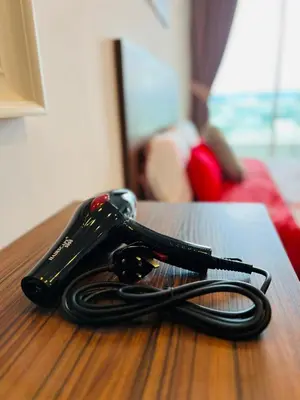 a pair of keys sitting on top of a table at Mansion One l 4pax Studio l Cityview l Gleneagle l by PerfectSweetHome in George Town